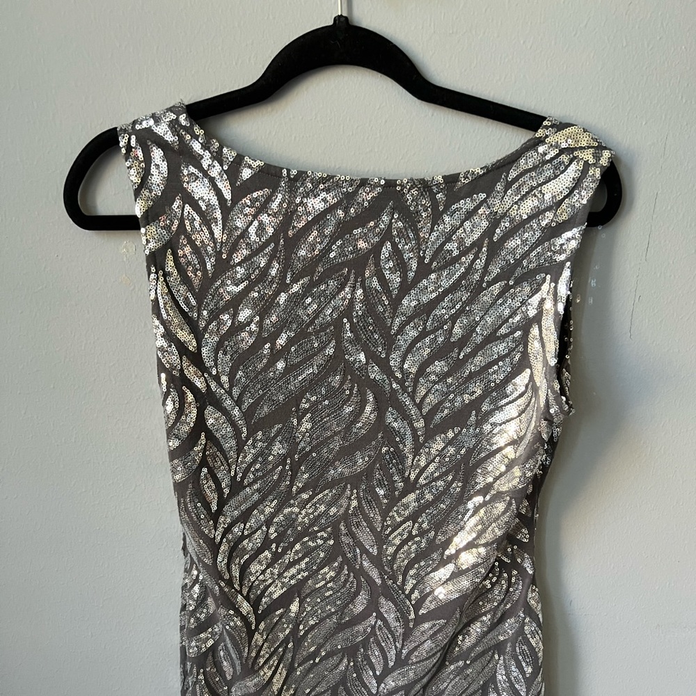 Silver metallic. Stretchy
